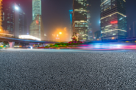 light trails at downtown district,shanghai china.の写真素材
