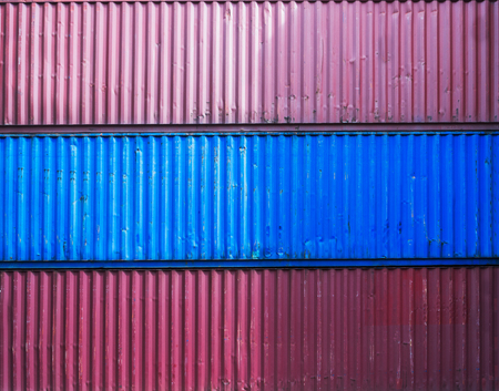 the surface texture of three cargo containers,three containers have no labels.