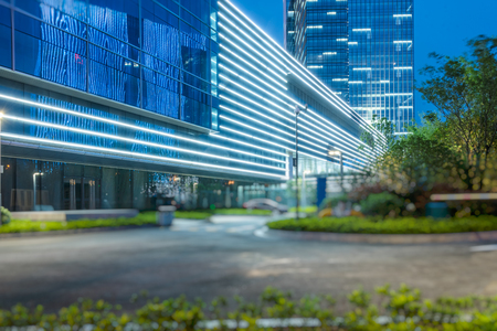 clean asphalt road through office block area,suzhou,china.のeditorial素材