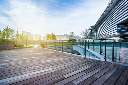 empty wooden floor with modern buildings background,shanghai,china.のeditorial素材
