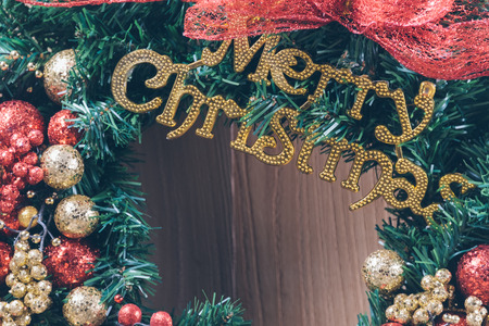 Christmas wreath with text merry christmas.の写真素材