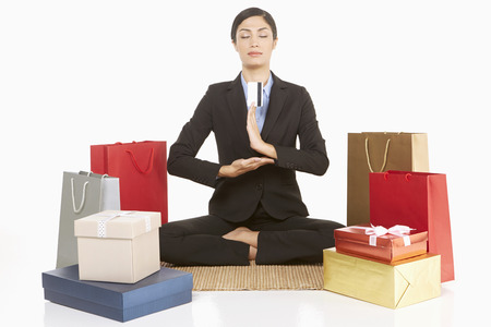 Businesswoman meditating with eyes closedの写真素材