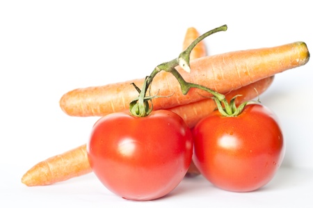 image of tomato and carrot on white backgroundの写真素材