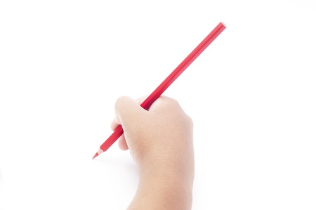 child holding pencil isolated on white backgroundの写真素材