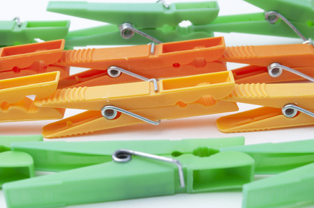 clothes pin colors isolated on white backgroundの写真素材