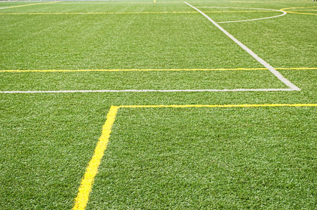  part of football field with green synthetic grass and 