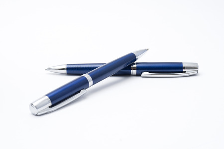 Closeup of a pen lying on a white backgroundの写真素材