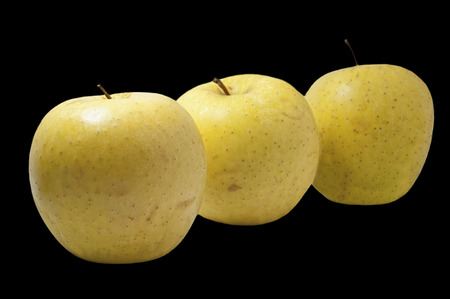 apples  isolated on black backgroundの写真素材