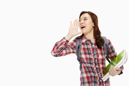 Cheerful woman shouting outの写真素材