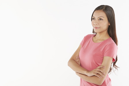 Woman with arms crossed, smilingの写真素材