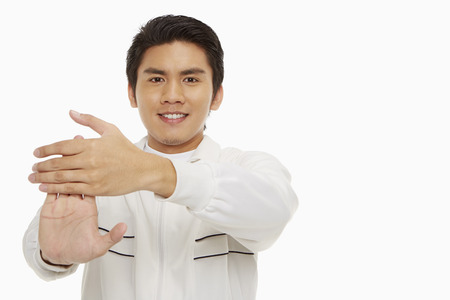 Man stretching his right palmの写真素材