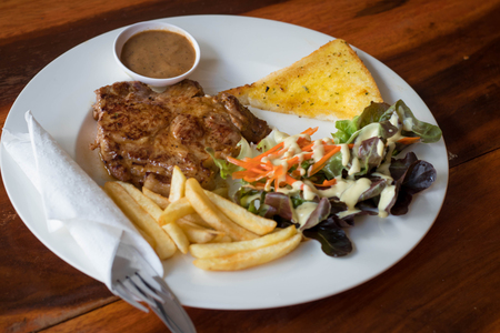 Black pepper pork steak on selective fogusの写真素材