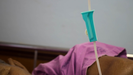 saline solution IV at hospital room on selective focusの写真素材