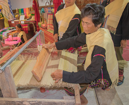 Soft focus of the housewives group included a demonstration of mat weaving. At the awards ceremony, the mother was outstanding.のeditorial素材