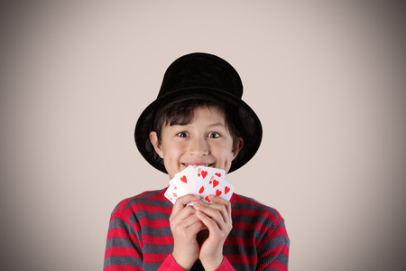 Young expressive magician with vintage colors and effectsの写真素材