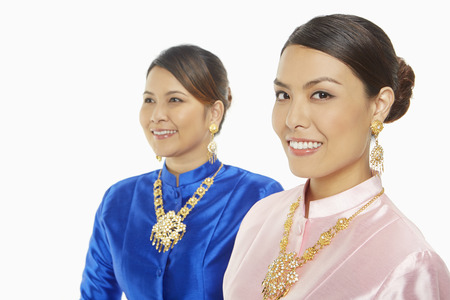 Cheerful women in traditional clothing の写真素材