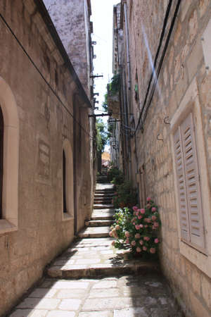 an old street in the old town korculasの写真素材