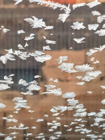 the morning crystal ice on glass in a carの写真素材