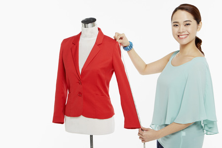 Woman taking measurementsの写真素材