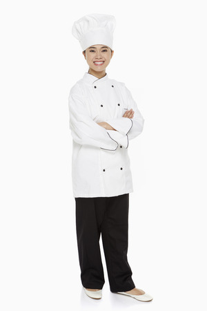 Portrait of a female chef smilingの写真素材