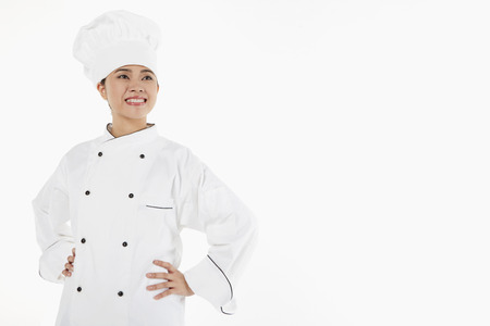 Portrait of a female chef smilingの写真素材
