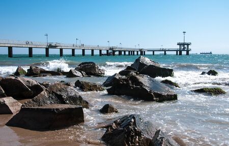 sea pier on sea background with ships