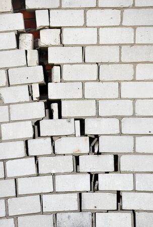 brick wall with a crack for your designの写真素材