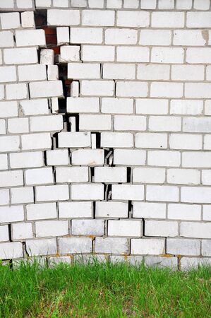 Brick wall with a crack for your designの写真素材
