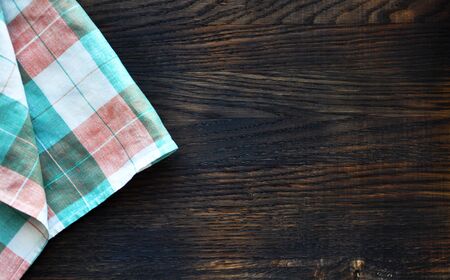 Napkin on wooden background. Top viewの写真素材