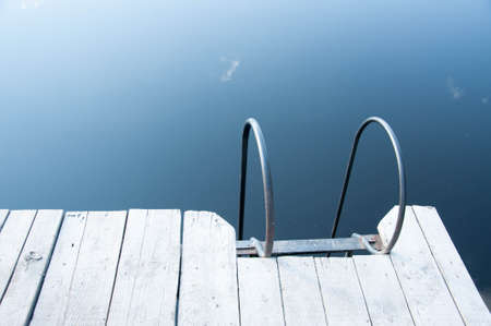 Small wooden pier near the river. Quality image for your projectの写真素材