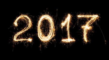 isolated 2017 written with Sparkle firework on black background , 2017 Happy New Year background concept.の写真素材