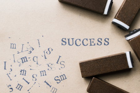 alphabet letter word success from stamp letters font on paper for success concept backgroundの写真素材