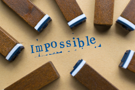 alphabet letter word impossible from stamp letters font on paper for impossible concept background