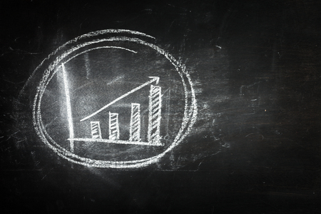 positive graph on blackboardの写真素材