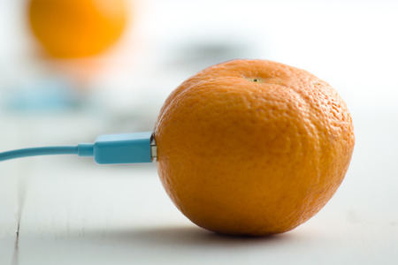 Smartphone charging battery from orange fruit, Smart and Eco - Friendly to Charge Smartphone...