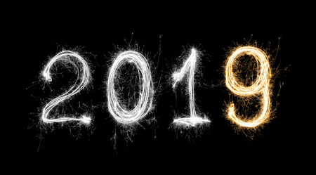 isolated 2019 written with Sparkle firework on black background, happy new year 2019 concept.

の写真素材