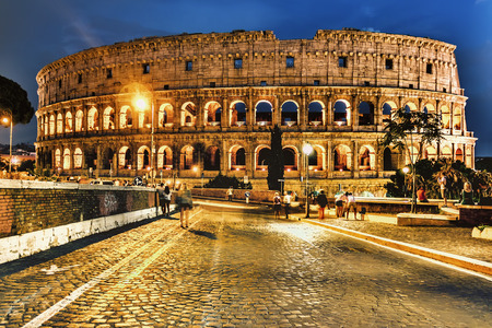 Rome / Italy - August 26, 2018: The Colosseum night view from the road