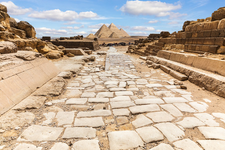 Giza Temple ruins and the road to the Great Pyramids, Egyptの写真素材