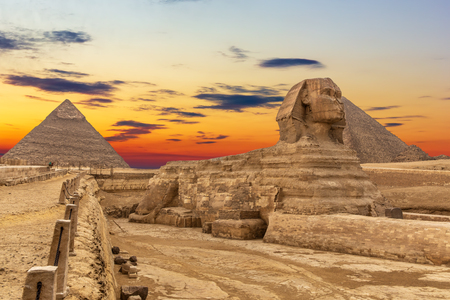 The Sphinx and the Pyramids at sunset, beautiful view, Giza, Egyptの写真素材