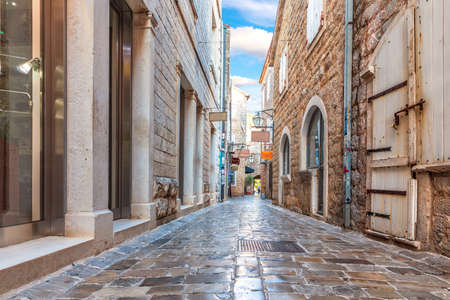 Narrow adriatic street in the Old Town Of Budva, Montenegroの写真素材