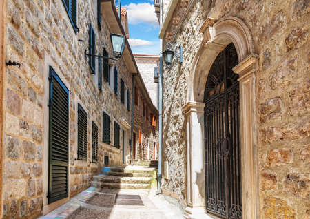Medieval street in the Old Town of Herceg Novi, Montenegro, no peopleの写真素材