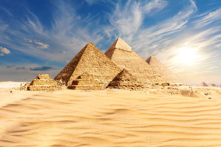 The Pyramids of Giza at sunset in Egypt, the main view.の写真素材