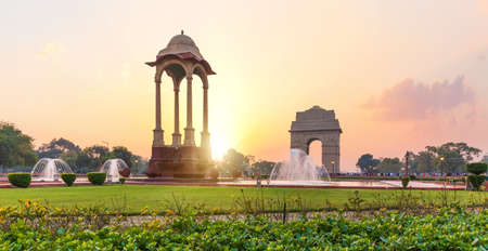 The India Gate and the Canopy at sunset in New Delhi, view from the National War Memorial.の写真素材