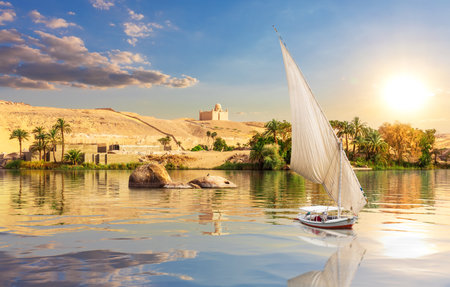 The Nile and traditional African village near Aswan, Egypt.の写真素材
