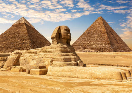 The Great Sphinx between the Khafre and Menkaure Pyramids of Giza, Cairo, Egypt.の写真素材