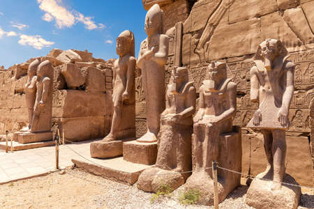 Tuthmosis III statues in front of Karnak's Temple 7th pylon, Luxor, Egypt.の写真素材