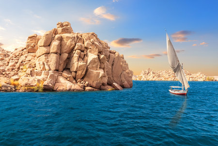 Lake Nasser in the Nile, beautiful view with a sailboat, Aswan, Egyptの写真素材