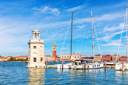 Lagoon of Venice, lighthouse and boats, beautiful italian viewの写真素材
