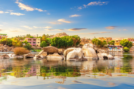 Picturesque banks of the Nile and traditional buildings of Aswan, Egypt.の写真素材