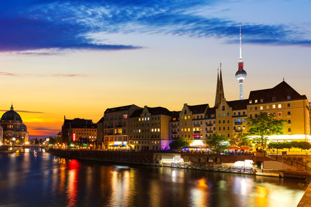 River Spree and the downtown buildings of Berlin, evening lights view, Germany.の写真素材